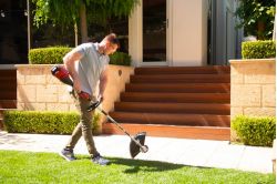 Toro 60V MAX battery string grass trimmer in action