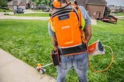Stihl KMA 130 R Cordless KombiEngine pictured with backpack battery system